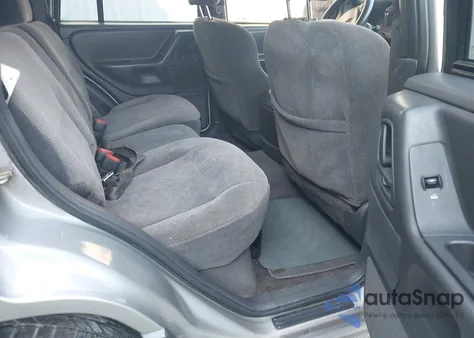 2001 Jeep Grand Cherokee Laredo из США, поврежденный, VIN 1J4GX48S01C735854